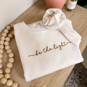 Embroidered "Be The Light" Sweatshirt