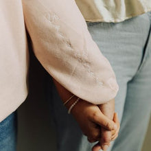 Embroidered "She Is Strong" Sweatshirt